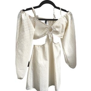 Short Spring/ Summer dress. Never worn. Still has tags. Size Small from H&M.